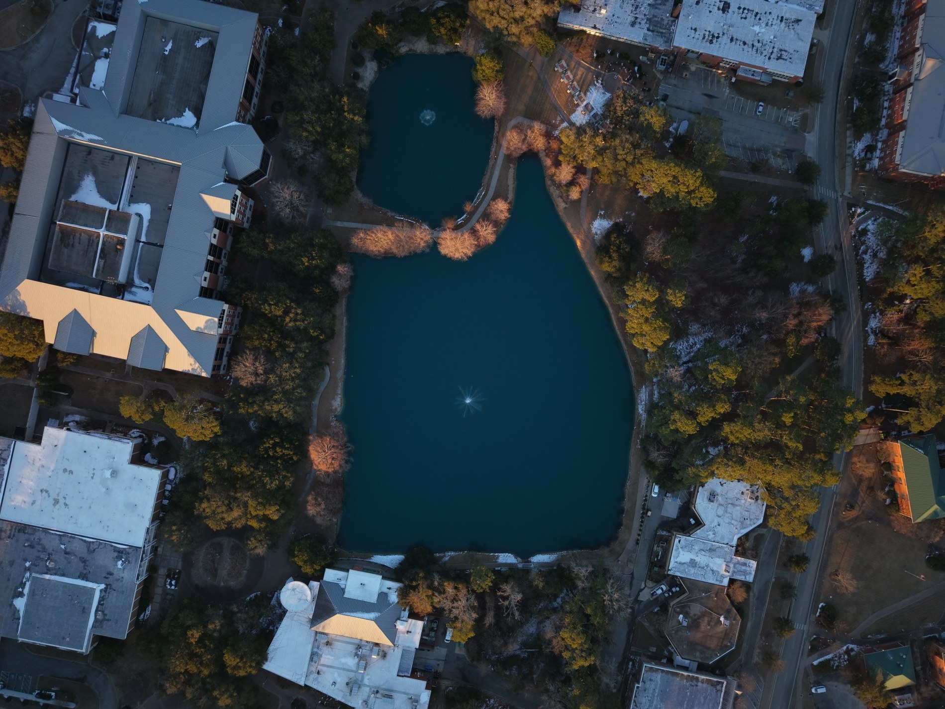 Drone photo over a campus lake