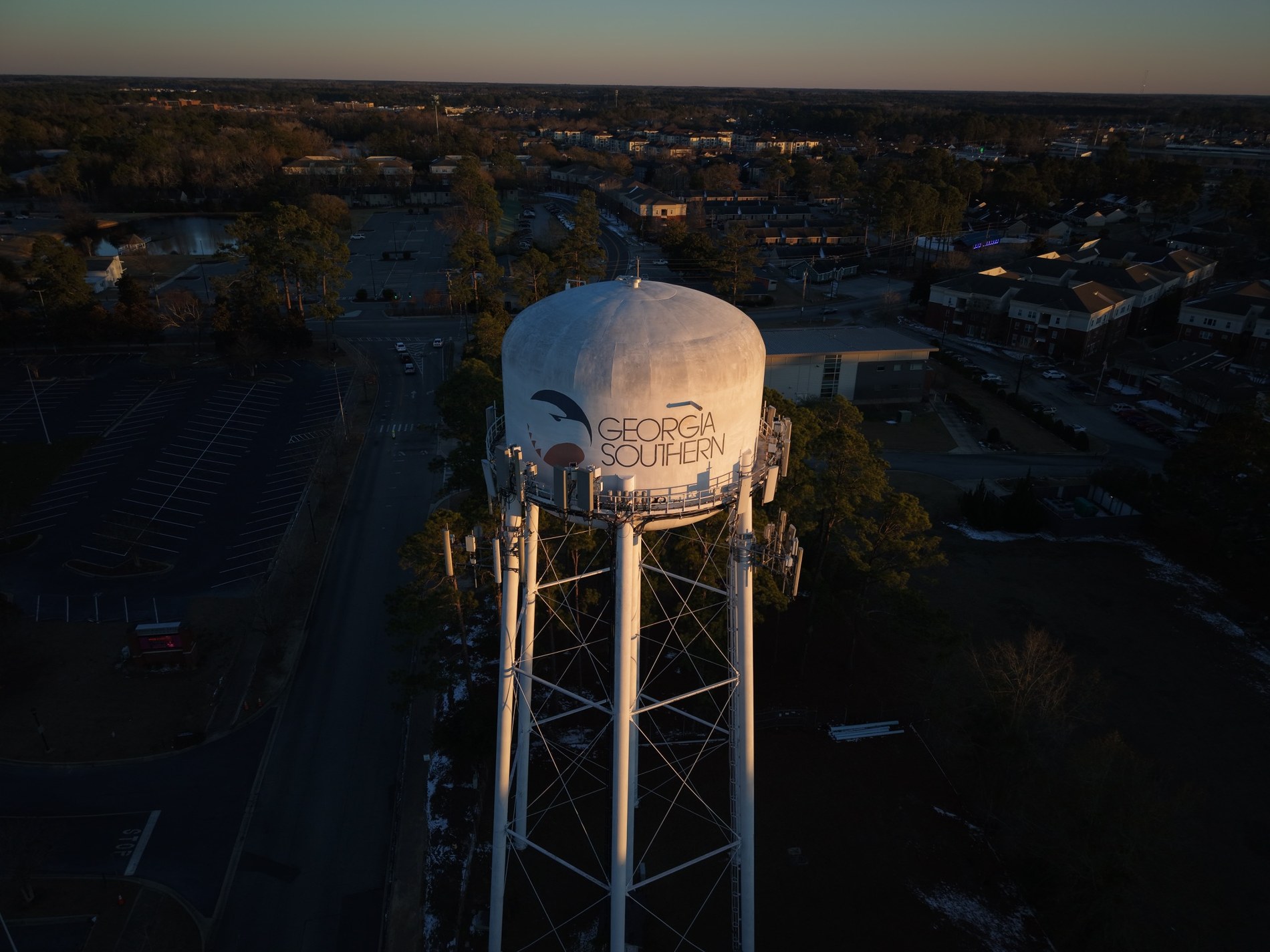 Drone photo of a water tower at sunset